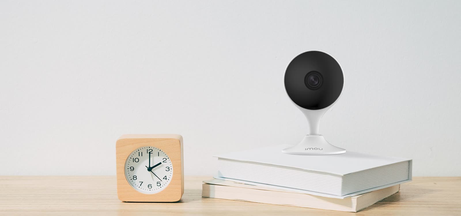 IMOU Cue 2 compact indoor WiFi camera on a desk