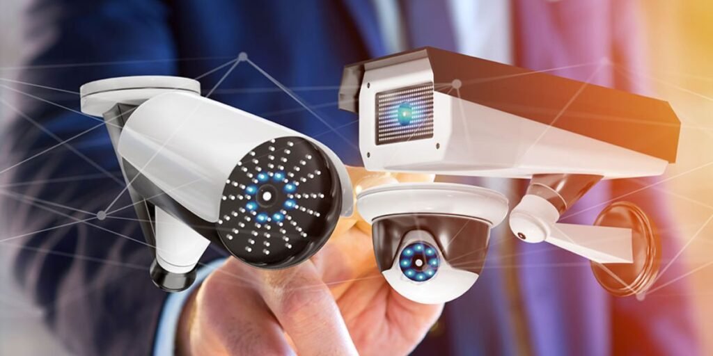 Person pointing at floating CCTV security cameras with digital network connections in background