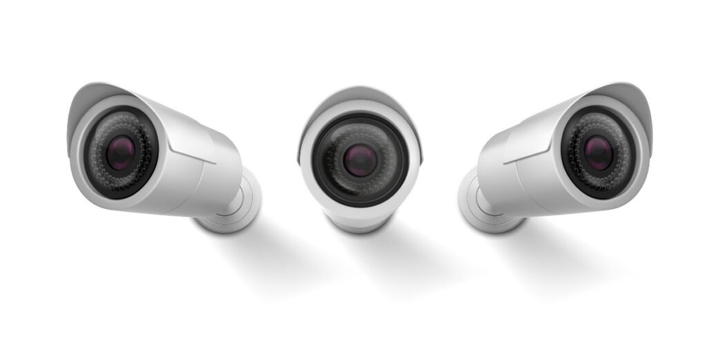 Three silver bullet security cameras displayed from different angles against a plain, solid white background.