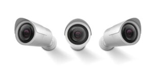 Three silver bullet security cameras displayed from different angles against a plain, solid white background.