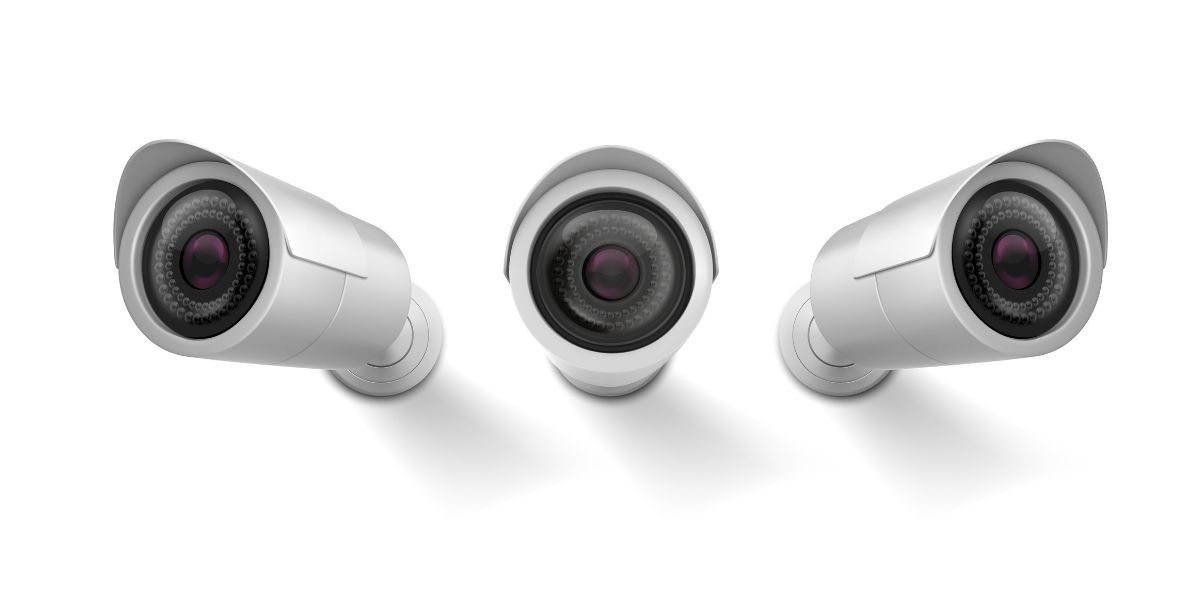 Three silver bullet security cameras displayed from different angles against a plain, solid white background.