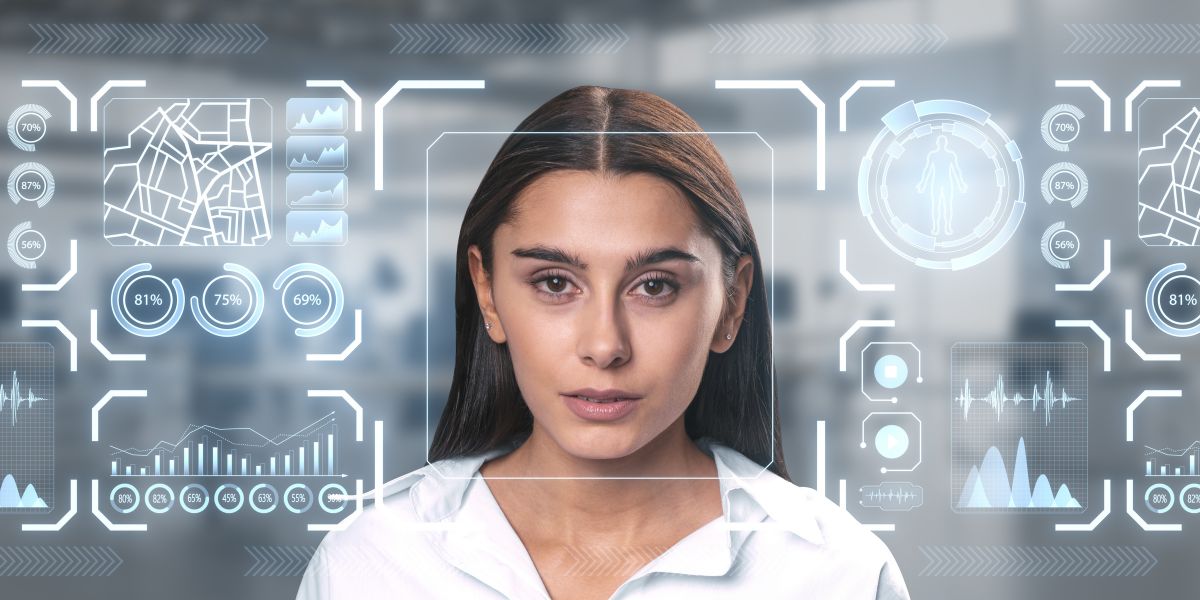 Woman's face centered in a digital HUD with scanning boxes, data graphs, and biometric icons for AI facial recognition.